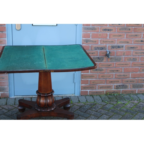 33A - William IV / early Victorian mahogany games table, carved tapered column, raised on four acorn feet,... 