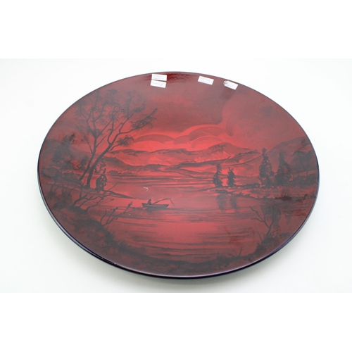 118 - Peggy Davies Ruby Fusion artist proof charger of a mountainous lake scene, 41cm diameter.