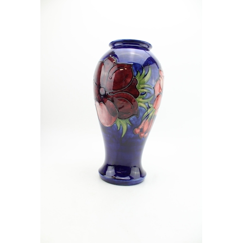 124 - Large Moorcroft Clematis on blue baluster vase, 32cm tall.