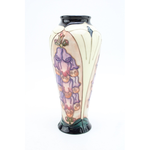 127 - Moorcroft pottery vase in the Foxglove design, dated 1993, 20.5cm tall.