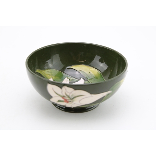 128 - Moorcroft bowl in the Bermuda Lily pattern, 16cm diameter.