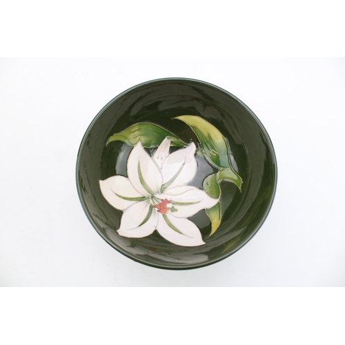 128 - Moorcroft bowl in the Bermuda Lily pattern, 16cm diameter.