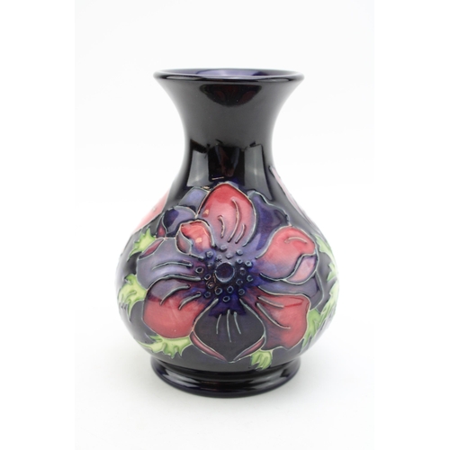 129 - Moorcroft bulbous vase in the Clematis pattern, 16cm tall.