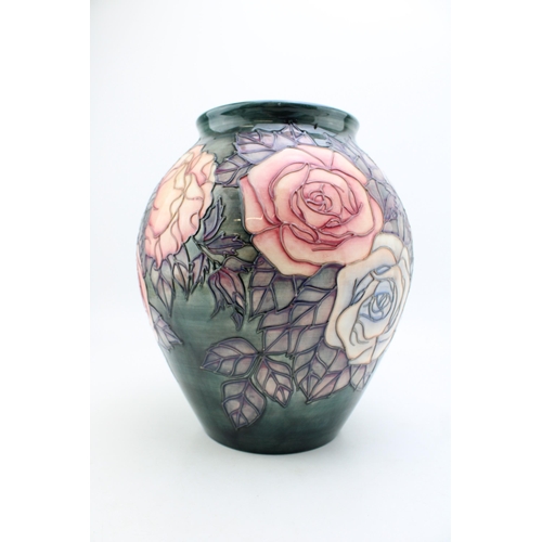 130 - Moorcroft large bulbous vase, decorated with floral design, 27cm tall.