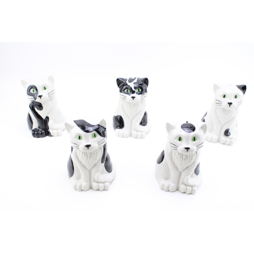 143 - A collection of Wade cat money boxes in five different designs. Height 16.5cm. (5)