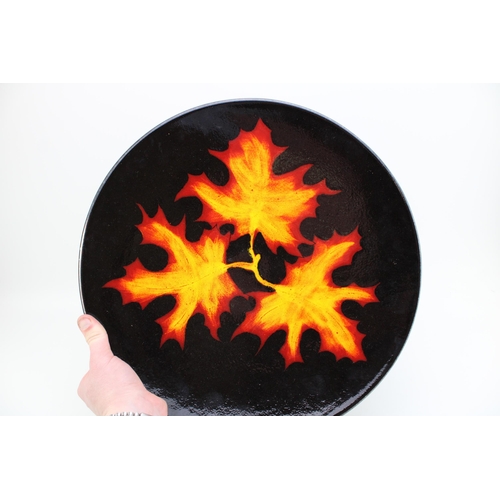 148 - Poole Pottery large abstract charger in the Forest Flame design, 41cm diameter.