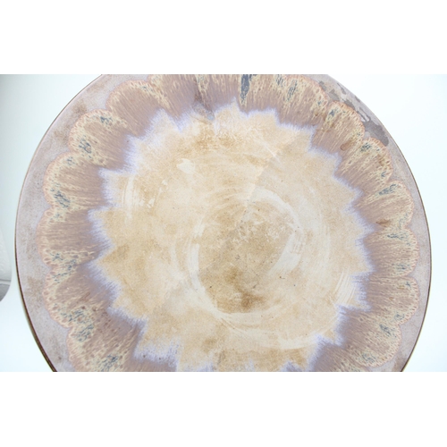 158 - Large Poole Pottery charger in copper lustre colourway, 41cm diameter.