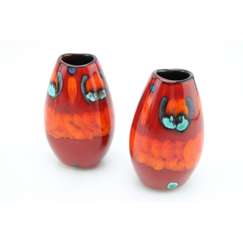 162 - A Pair of Poole Pottery 'Volcano Manhattan' vases by Jackie Moulton. Height 11cm.