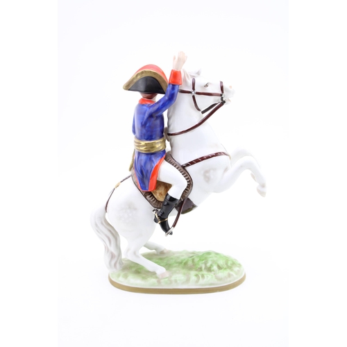 182 - Continental pottery model of a soldier on rearing horseback, possibly Napoleon, with backstamp Crown... 