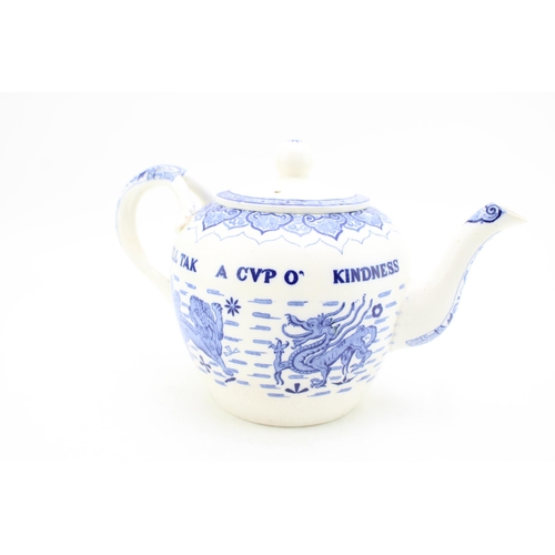 184 - A 19th century Spode blue and white teapot with verse 'Yet For Days O' Auld Land Syne'. Height 16cm.