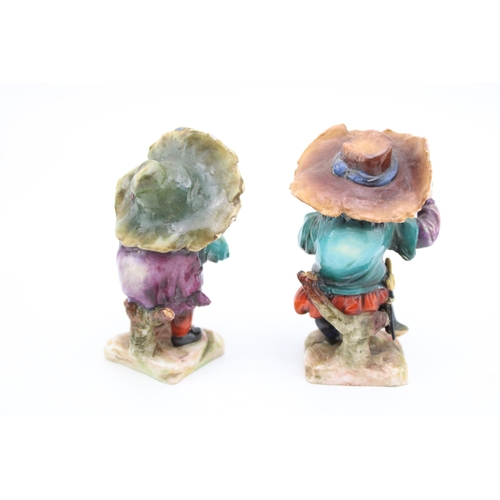 188 - A pair of German pottery figures 'House Mansion Dwarf), both with instruments (2), 9.5cm tall.