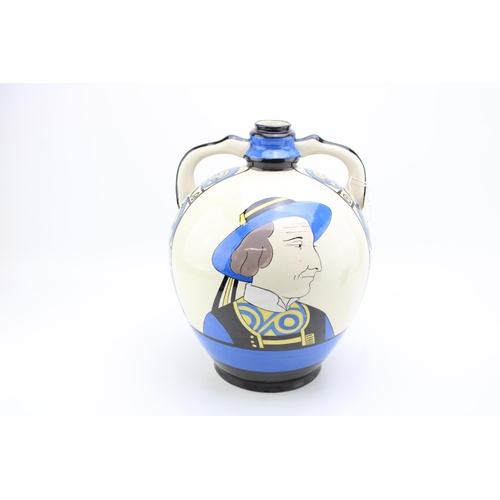 204 - HB Quimper large two handled marriage flagon, with a profile of a man and a woman, Art Deco influenc... 