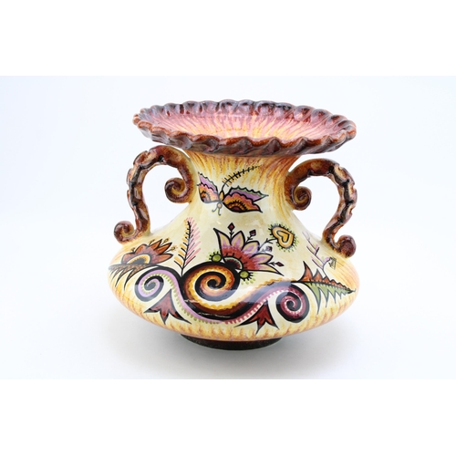 206 - Large Quimper two handled vase, shaped handles and rim, butterfly decoration amongst foliage, 29cm w... 