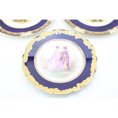 222 - A trio of cabinet plates, each with cobalt blue border with gilt highlights, to include two Coalport... 