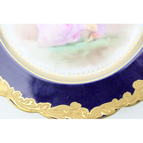 222 - A trio of cabinet plates, each with cobalt blue border with gilt highlights, to include two Coalport... 