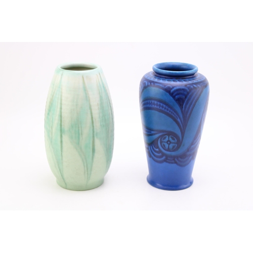 224 - Two Royal Lancastrian vases, one with swirling design on blue background, the other mottled ribbed v... 