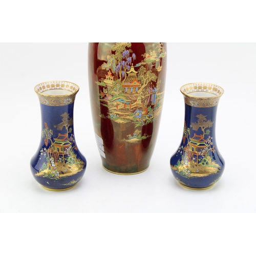 229 - A pair of Carlton Ware Pagoda vases, blue backgrounds, 15cm tall, with a Crown Devon Fieldings Rouge... 