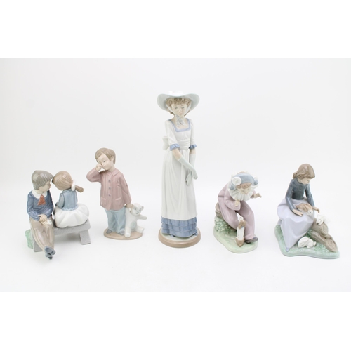 237 - A collection of Nao figures to include a pair of seated children, a lady in a bonnet, a girl with ra... 