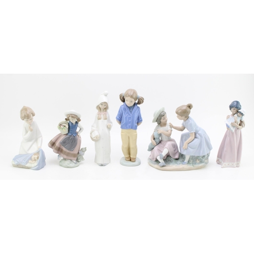 238 - A collection of Lladro to include an Angel with Bab 4635, a Girl with Flowers 5221, a lady with her ... 