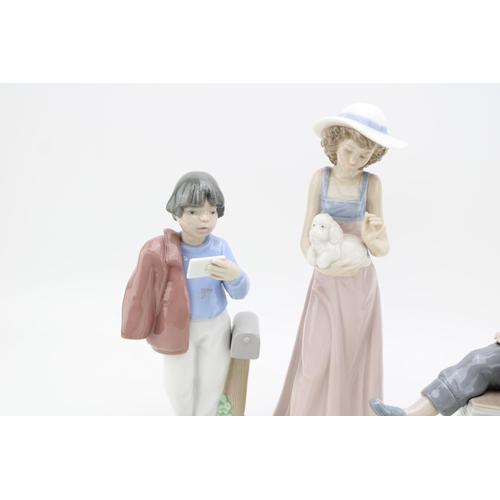 242 - Nao figures to include a boy selling newspapers, a baby, a girl with her poodle and others (5), tall... 