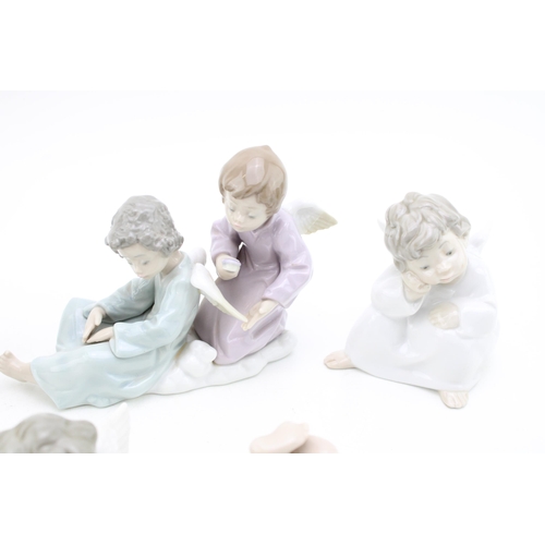 247 - Lladro figures to include a Angel Care 5727, a cherub / angel, a similar item and girl with lost lam... 