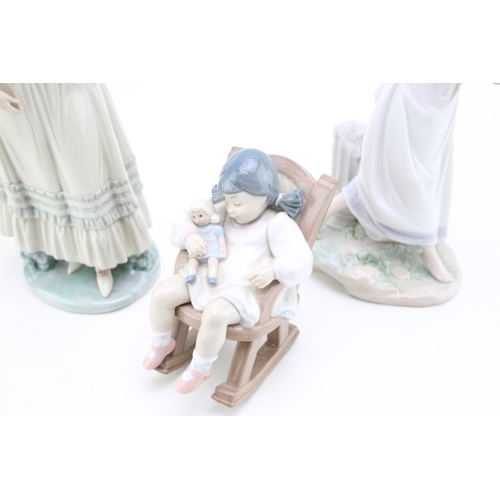 257 - Lladro figures to include Garden of Athens 7704, Naptime Girl 5448 and a lady wearing a headdress (3... 