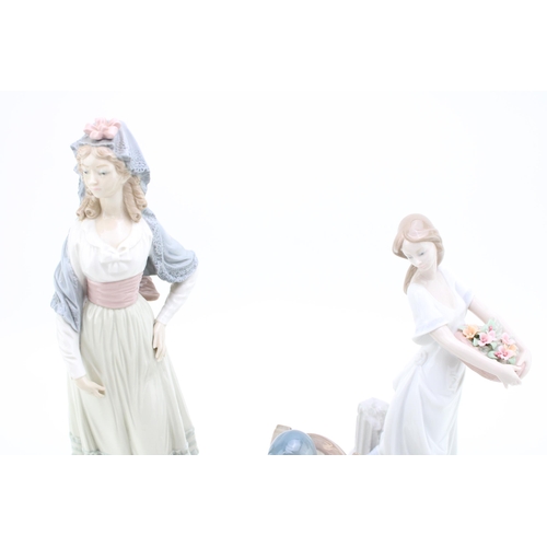 257 - Lladro figures to include Garden of Athens 7704, Naptime Girl 5448 and a lady wearing a headdress (3... 