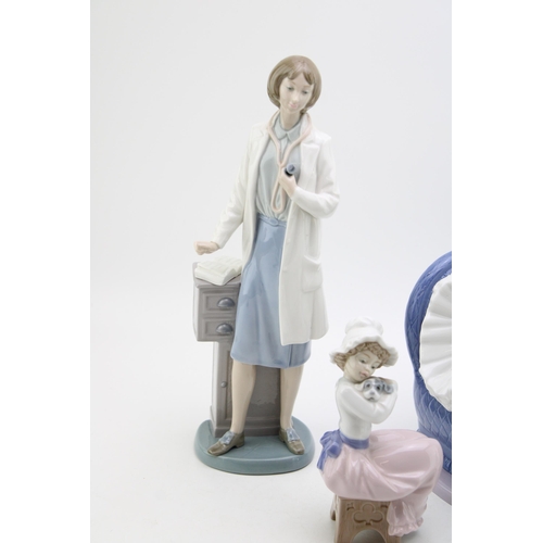 259 - Nao figures to include a girl on an armchair, a nurse and 3 others (5).