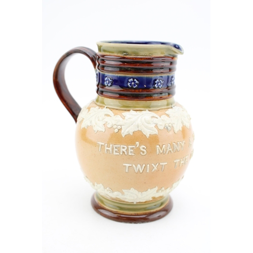 265 - A Doulton Lambeth jug, bearing the moto 'There's Many a Slip Twixt The Cup and the Lip' impressed ma... 