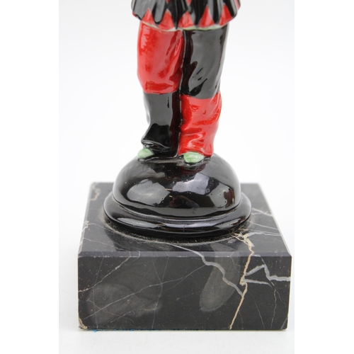 268 - A ceramic Harlequin figure playing the mandolin on marble base,  possibly Doulton or similar. Height... 