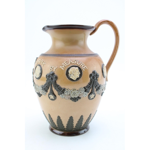 275 - Doulton Lambeth stoneware jug 'Bread at Pleasure, Drink by Measure', 20.5cm tall.