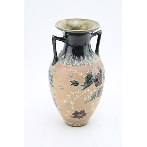 276 - Doulton Lambeth two handled vase 'Art Union of London' to base, floral decoration, 25cm tall.