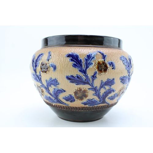 278 - Doulton Lambeth stoneware jardiniere, blue floral decoration on brown background, 23.5cm diameter.