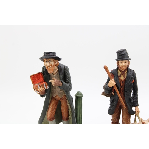 300 - Royal Doulton resin figures to include Fagin, Bill Sykes and a pair of chaps (3), 22.5cm tall.