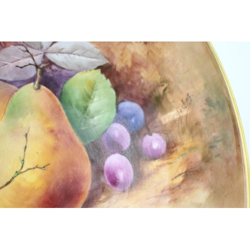 305 - Coalport bowl, still life fruit scene, signed P. Gosling, raised on three feet, 27cm diameter.