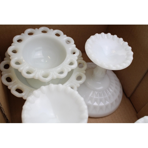 319 - A collection of milk glass bon bon dishes in the Old Colony pattern to include scalloped edge exampl... 