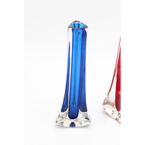 332 - Two Whitefriars Tricorn glass vases, in blue and red colourways (2), 24.5cm tall.