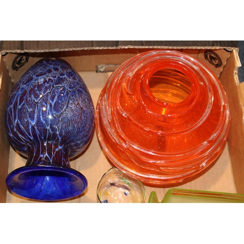 334 - A mixed collection of mid century decorative glass vases to include blue, orange, green and clear gl... 