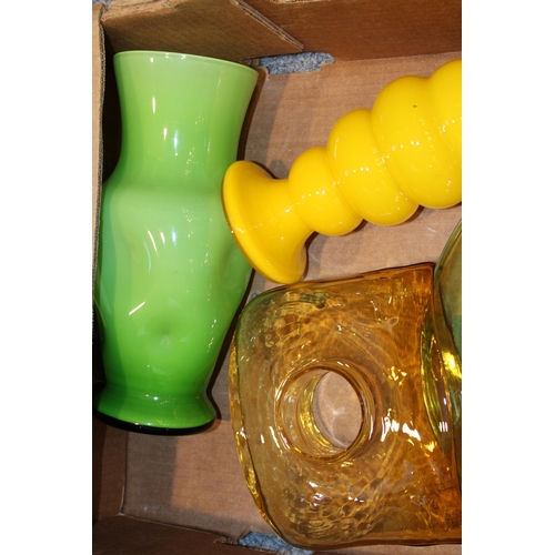 336 - A mixed collection of mid century decorative glass vases to include green, yellow and orange example... 