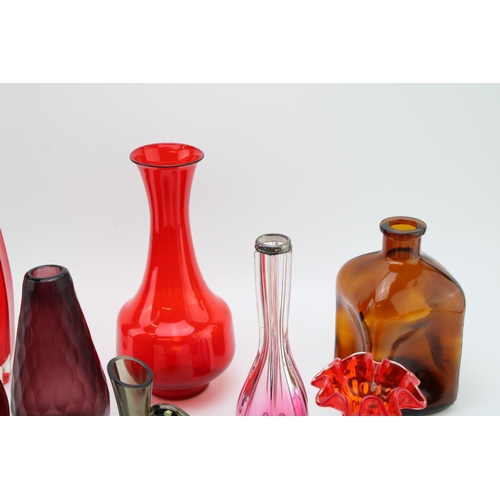 353 - A collection of vintage glassware to include mid century examples predominantly in reds and purples.... 