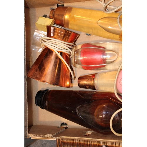 360 - A collection of vintage lava lamps dating from the 1960s and 1970s. With copper bases. Height 44cm. ... 