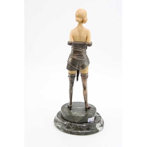 370 - A nude figure in resin and metal on marble base. Height 34cm.