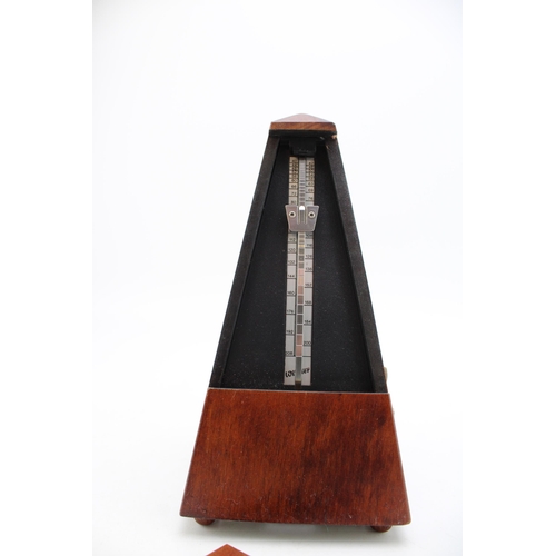 373 - A vintage metronome made in Germany. Height 22cm.