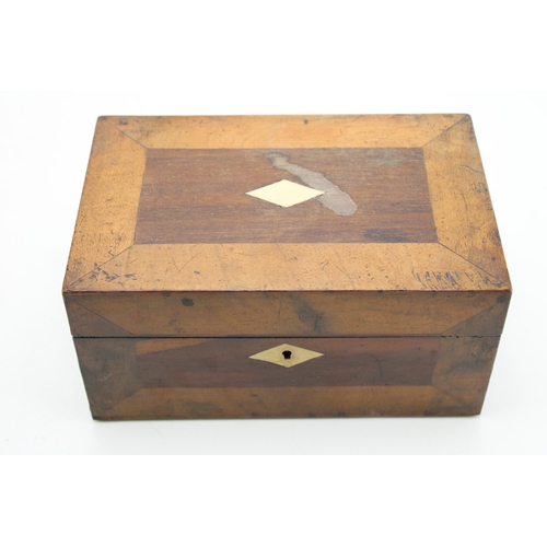 374 - An antique box with silk lining. Height 10.5cm.