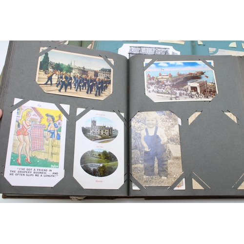 415 - Three late 19th / early 20th century postcard albums to include holiday / site seeing destinations, ... 