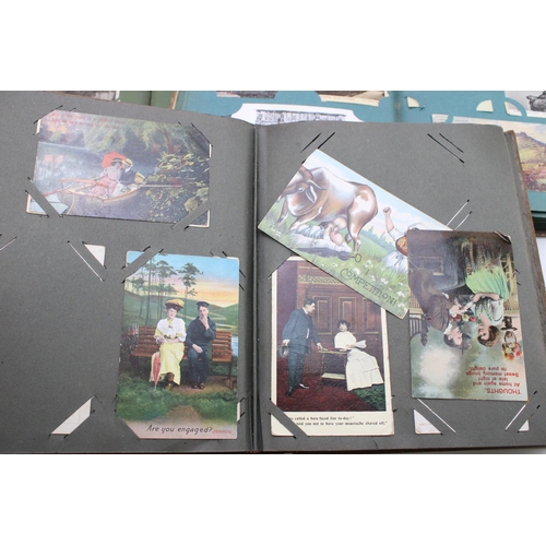 415 - Three late 19th / early 20th century postcard albums to include holiday / site seeing destinations, ... 