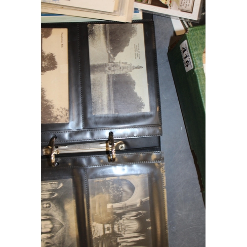 416 - A large mixed collection of antique and vintage postcards to include two folders together with loose... 