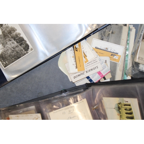 417 - A large mixed collection of antique and vintage postcards to include three folders together with loo... 