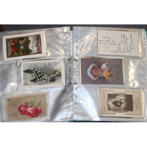 418 - A large and varied collection of antique and vintage postcards to include four folders together with... 