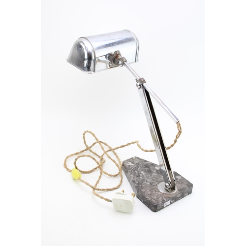 427 - A French Art deco 'Carl' desk lamp, chrome shade and adjustable arm on marble base. Height 36cm.